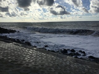 Waves on the Black Sea. Sochi. Pebble beach. Breakwater
