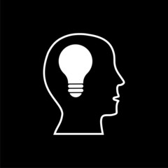 Human head creating idea icon isolated on dark background