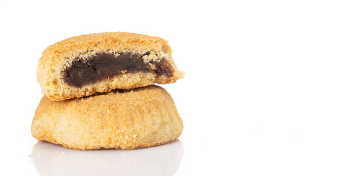 Turkish dessert Mamul with date fruit on white background