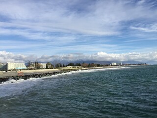 Waves on the Black Sea. Sochi. Pebble beach. Breakwater