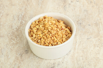 Crunched roasted peanut in the bowl