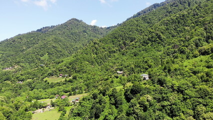 flying drone over green mountains with trees landscape, top view from above, aerial shot, inspirational wonderful nature
