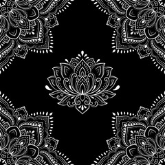 Seamless decorative ornament in ethnic oriental style. Circular pattern in form of mandala and Lotus flower for Henna, Mehndi, tattoo, decoration. Doodle outline hand draw vector illustration.