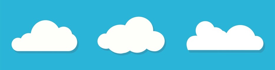 White clouds flat design set on blue background. 