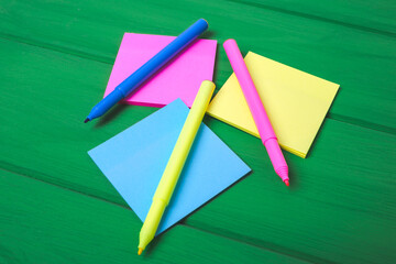 Colored paper and marker for childrens creativity.