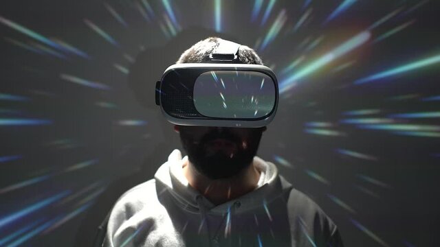 virtual reality concept. person with vr glasses with projection of an accelerating galaxy.