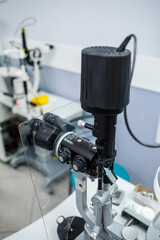Microscopic apparatus for testing eyesight. Ophthalmology and treatment of eye diseases. Eye clinic, optometrist concept