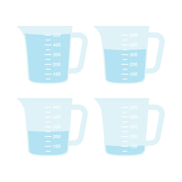 Kitchen measuring cups with various amount of liquid.