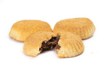 Turkish dessert Mamul with date fruit on white background