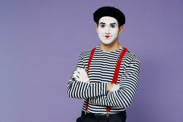 Strict confident charismatic stunning fun young mime man with white face mask wears striped shirt...