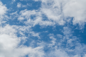 The bright blue sky was surrounded by white clouds, the atmosphere was like heaven.