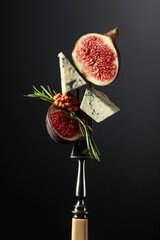 Blue cheese with figs, walnuts, and rosemary.