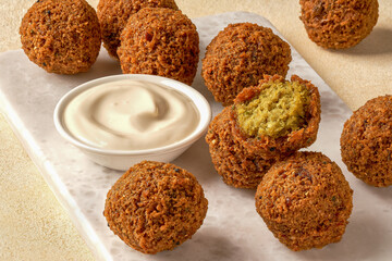 Chickpeas falafel with tahini sauce. Closeup