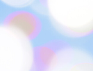 Abstract background defocused lights white blue pink blurred balls light color.