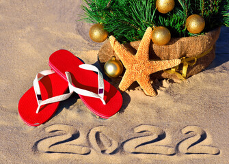 New Year 2022 on the beach. Christmas tree on the beach
