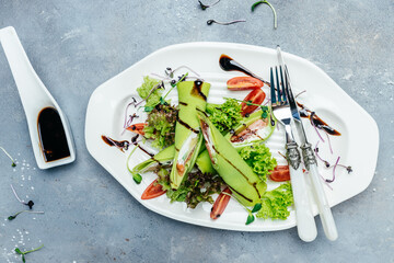 Delicious thin pancakes with salmon and sour cream. Delicious breakfast or snack, Clean eating, dieting, vegan food concept. top view