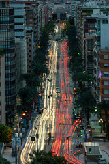 Long exposure with traffic lights at dusk in Alfonso X el Sabio Avenue, Alicante, Costa Blanca, Spain