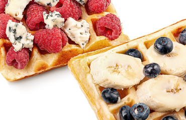 French waffles with berries, bananas and dorblu cheese isolated on white
