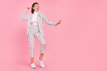 Full body image lady dancing relaxing wear white checkered suit clubber isolated on pink color background