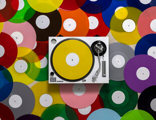 DJ turntables with different coloured records 