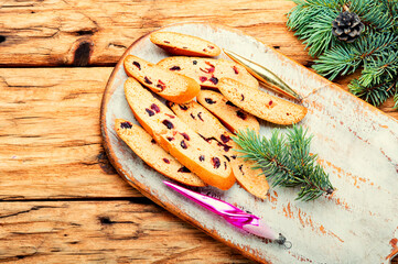 Italian cranberry biscotti on wooden table