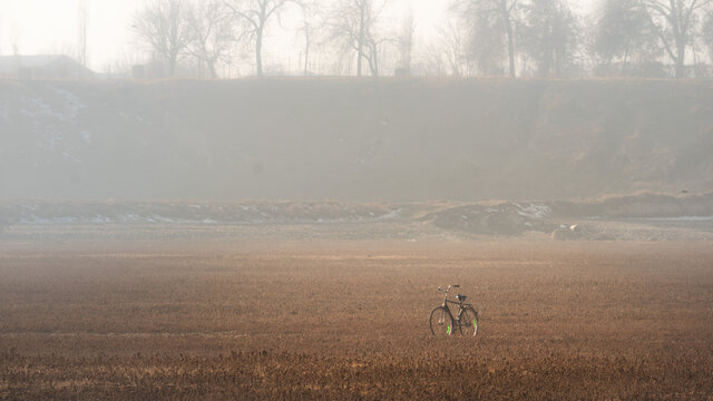 Live in the countryside.The bicycle in the a little foggy field. I felt connected to another world a place of utter peace and tranquility.