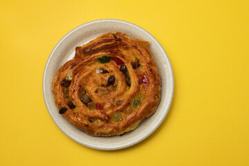 typical portuguese sweet bread with cream on the dish