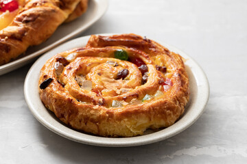 typical portuguese sweet bread with cream on the dish