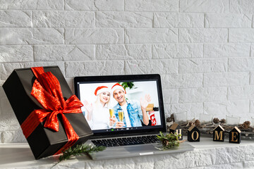 Christmas day Virtual meeting team teleworking. Family video call remote conference. Laptop webcam screen view. Diverse portrait headshots meet working from their home offices. Happy hour party online