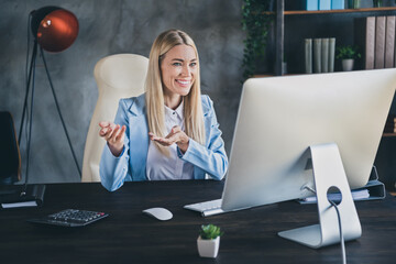Photo of banker investor hr lady sit desk video call applicant tell job vacancy remote distance in...