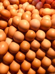 Pile of Fresh and raw chicken eggs.