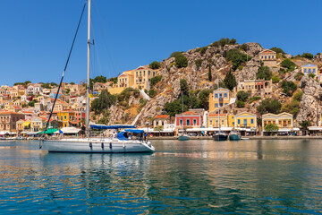 Sailing boats in port of Gialos, Symi island, Greece