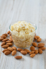sliced almonds on wooden surface