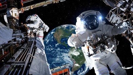 Astronaut spaceman do spacewalk while working for spaceflight mission at space station . Astronaut wear full spacesuit for operation . Elements of this image furnished by NASA space astronaut photos . © InfiniteFlow