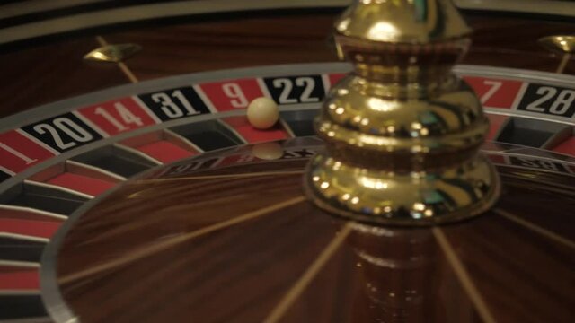 The rotating roulette wheel in the casino