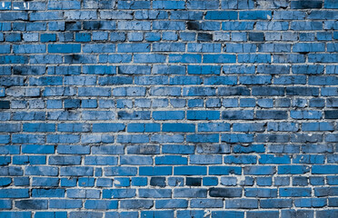 old blue brick wall