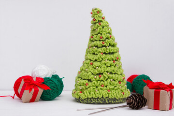 Knitted Christmas tree green. Handmade.