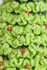 Close-up knitted green texture.