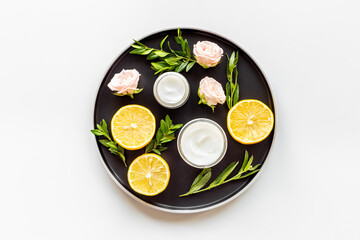 Skin face or body cream with medicine herbs and flowers