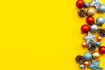 Christmas and New Year decoration frame with baubles and toys. Flat lay. Empty space for text
