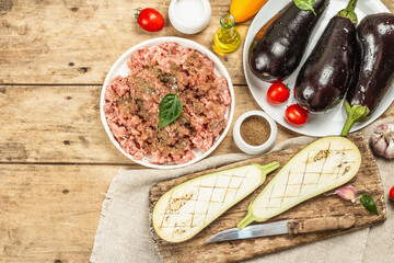 Stuffed eggplant ready to bake with ground meat, vegetables, and spices