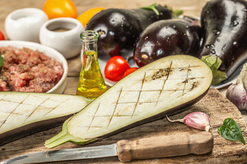 Stuffed eggplant ready to bake with ground meat, vegetables, and spices