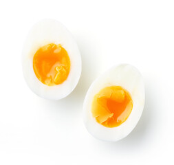 Soft boiled eggs isolated on white, from above