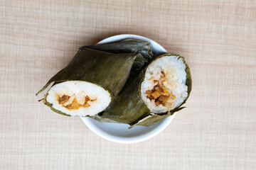 Arem-arem is a traditional snack from Indonesia. Made from sticky rice, filled with spicy chicken...