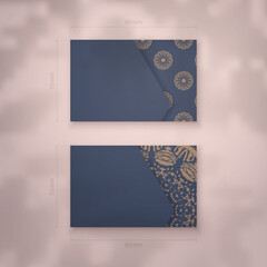 Blue color business card template with abstract brown pattern for your business.