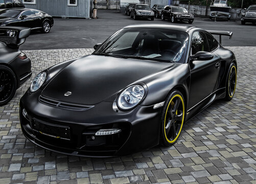 Kiev, Ukraine - May 14, 2011: Black supercar Porsche 911 (997) Turbo TechArt GT Street in the city