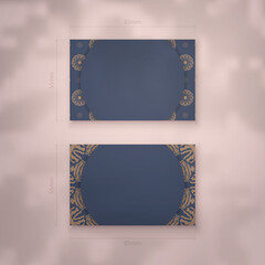 Blue color business card template with greek brown pattern for your business.