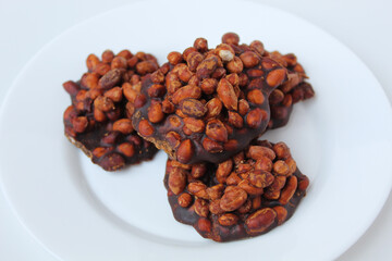 Gula kacang, is a traditional snack from Indonesia, made from roasted peanuts and brown sugar. Also called as Ampyang