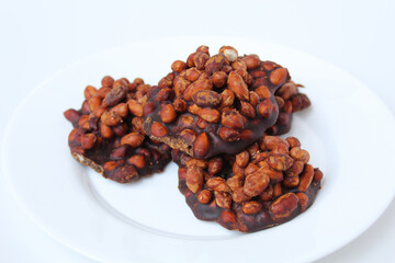 Gula kacang, is a traditional snack from Indonesia, made from roasted peanuts and brown sugar. Also called as Ampyang