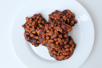 Gula kacang, is a traditional snack from Indonesia, made from roasted peanuts and brown sugar. Also called as Ampyang